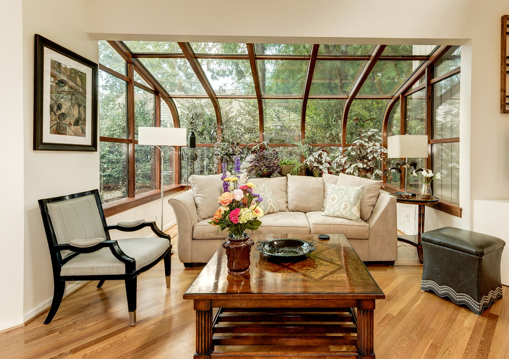 Inspiration for a traditional sunroom in DC Metro with medium hardwood floors, no fireplace and brown floor.