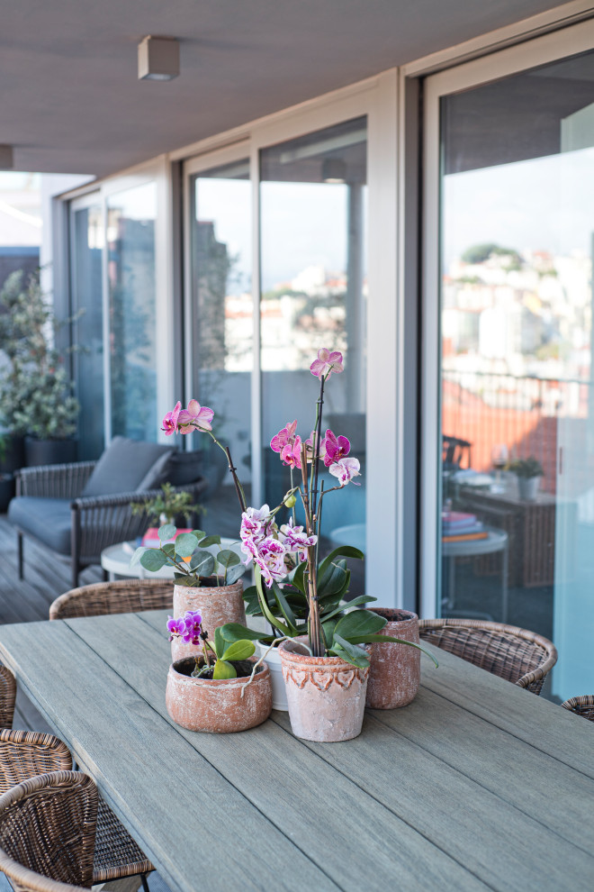 This is an example of an eclectic balcony in Other.