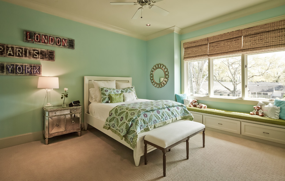 Photo of a mid-sized traditional kids' room for girls in Houston with carpet, green walls and beige floor.