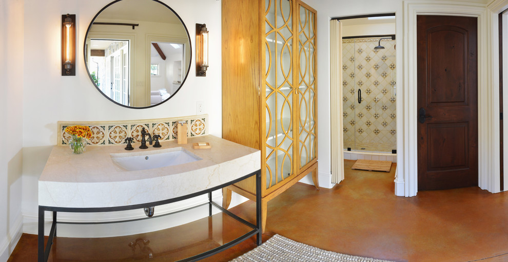 Inspiration for a mid-sized transitional 3/4 bathroom in San Francisco with white walls, concrete floors, open cabinets, an alcove shower, multi-coloured tile, porcelain tile, orange floor, a hinged shower door, white benchtops, a single vanity and a freestanding vanity.