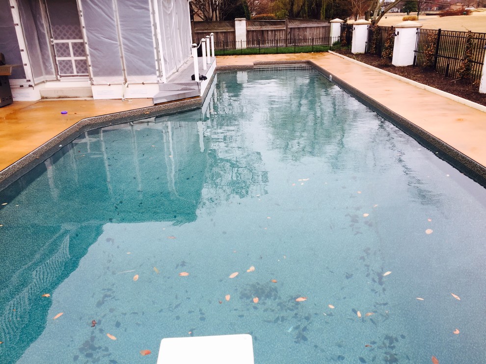 Pool fountain - mid-sized backyard rectangular natural pool fountain idea