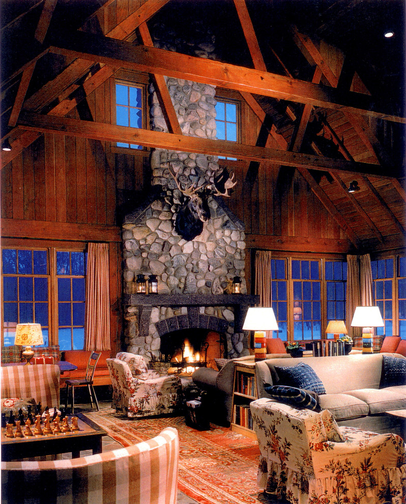 Inspiration for a rustic family room remodel in Chicago with a stone fireplace