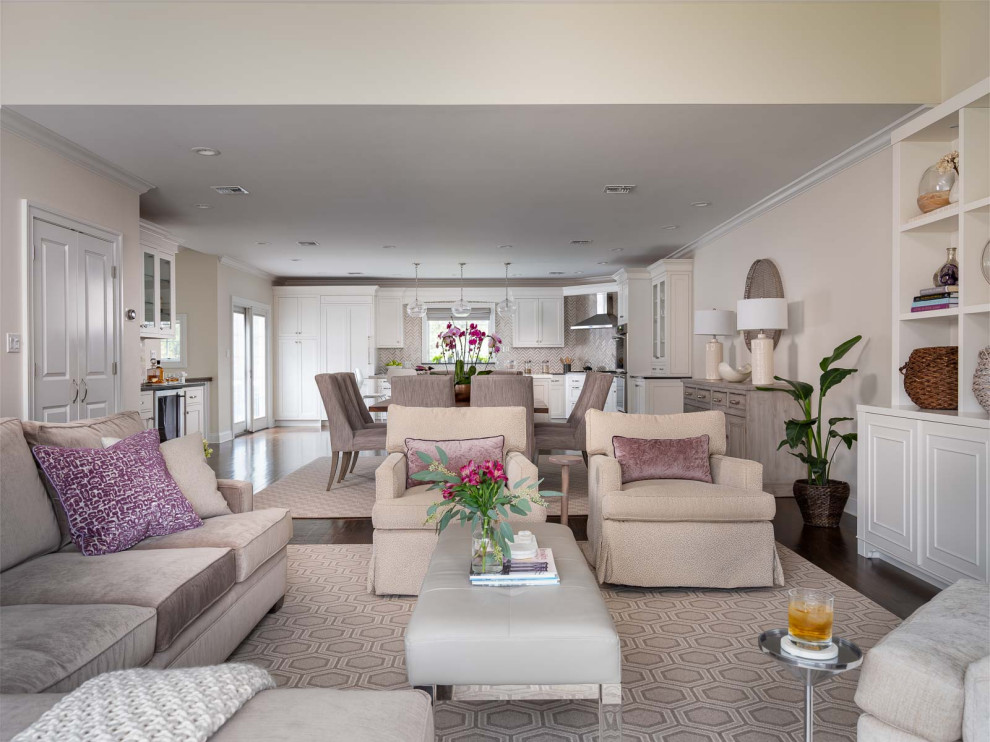 Example of a large transitional l-shaped medium tone wood floor and brown floor eat-in kitchen design in New York with a farmhouse sink, recessed-panel cabinets, white cabinets, quartz countertops, beige backsplash, porcelain backsplash, stainless steel appliances, an island and gray countertops