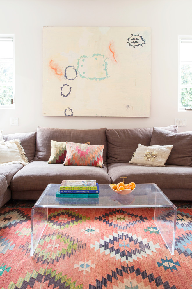 This is an example of an eclectic family room in Los Angeles.