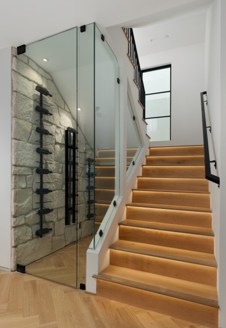 Staircase with Glass Railing contemporary-wine-cellar