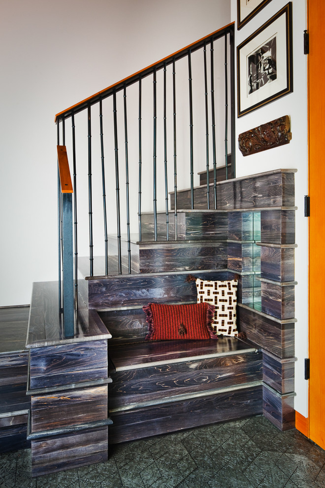 Photo of a transitional wood l-shaped staircase in San Francisco with wood risers.