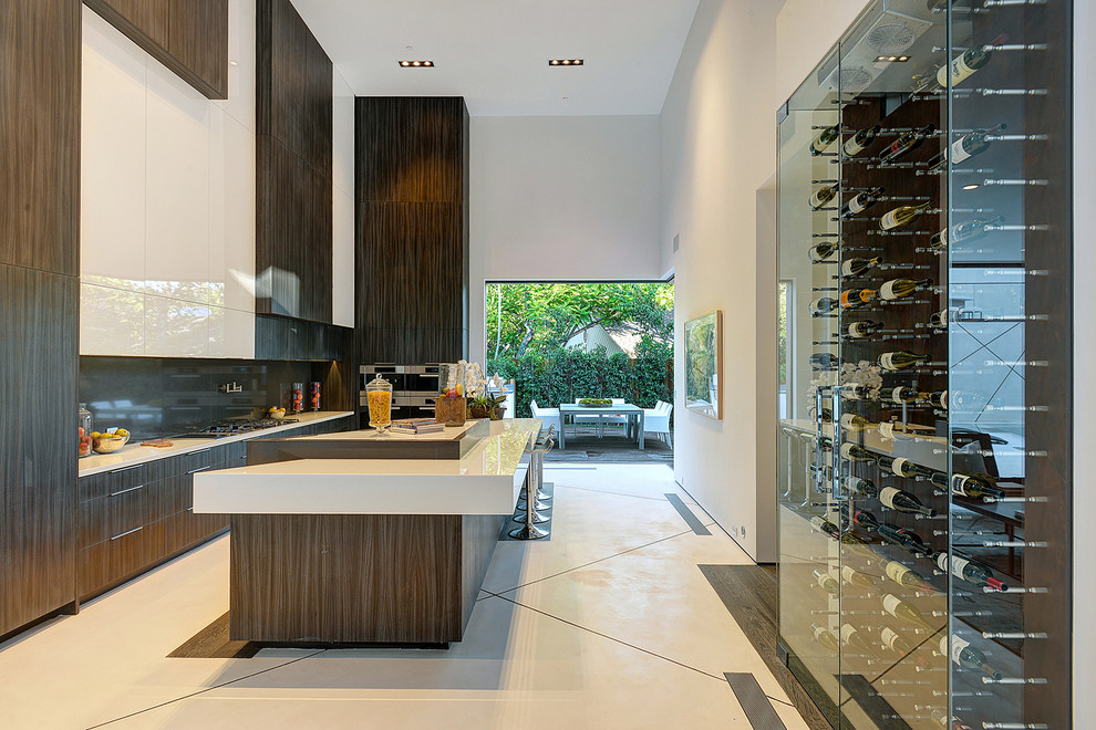 This is an example of a contemporary l-shaped kitchen in Los Angeles with flat-panel cabinets, dark wood cabinets, brown splashback, glass sheet splashback, stainless steel appliances and with island.