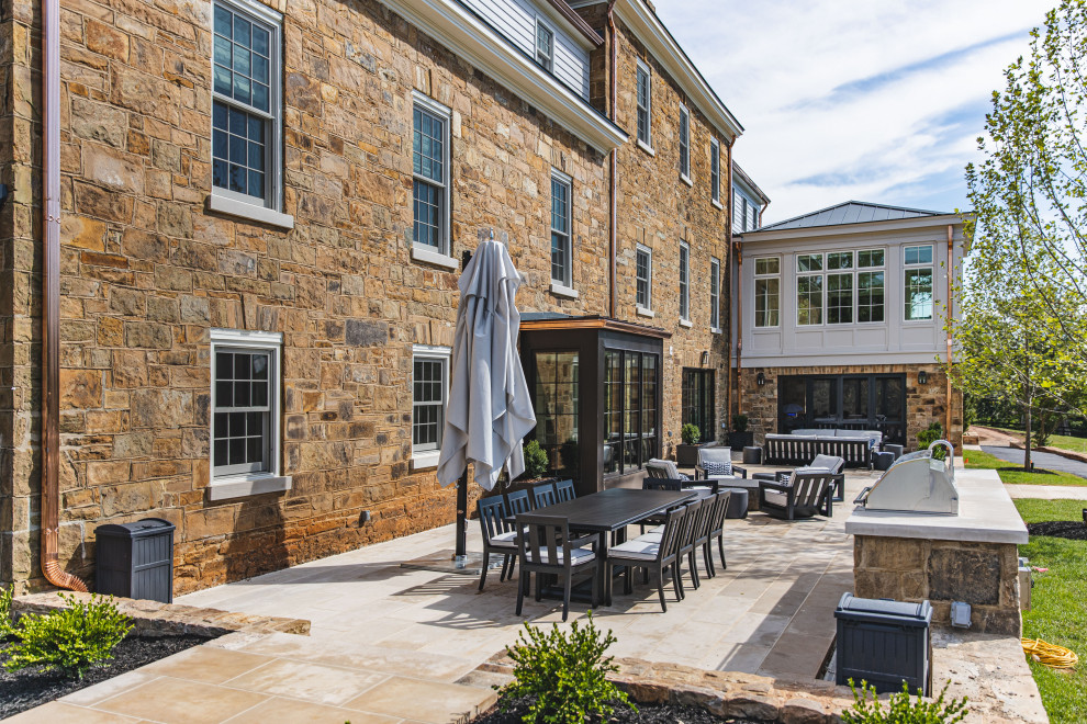 This is an example of a large farmhouse patio in DC Metro.
