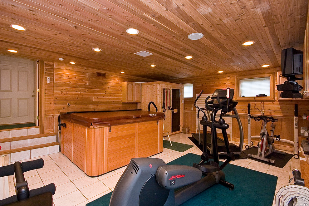 Photo of a large traditional home gym in Boston with ceramic floors.