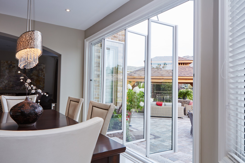 Mid-sized transitional porcelain tile and white floor great room photo in Toronto with no fireplace and beige walls