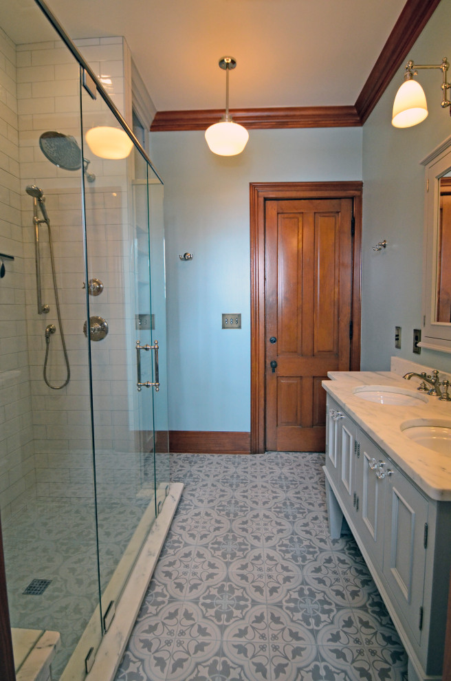Inspiration for a large traditional kids bathroom in Milwaukee with beaded inset cabinets, blue walls, dark hardwood floors, granite benchtops, white benchtops, a double vanity and a built-in vanity.