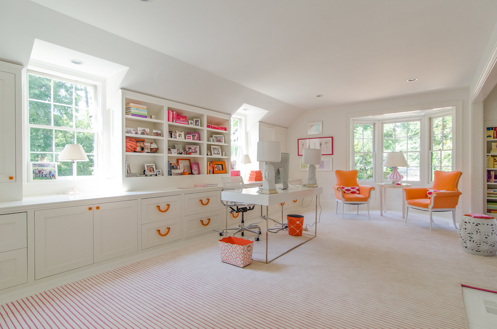 This is an example of a large home office in Atlanta with white walls, carpet and a freestanding desk.