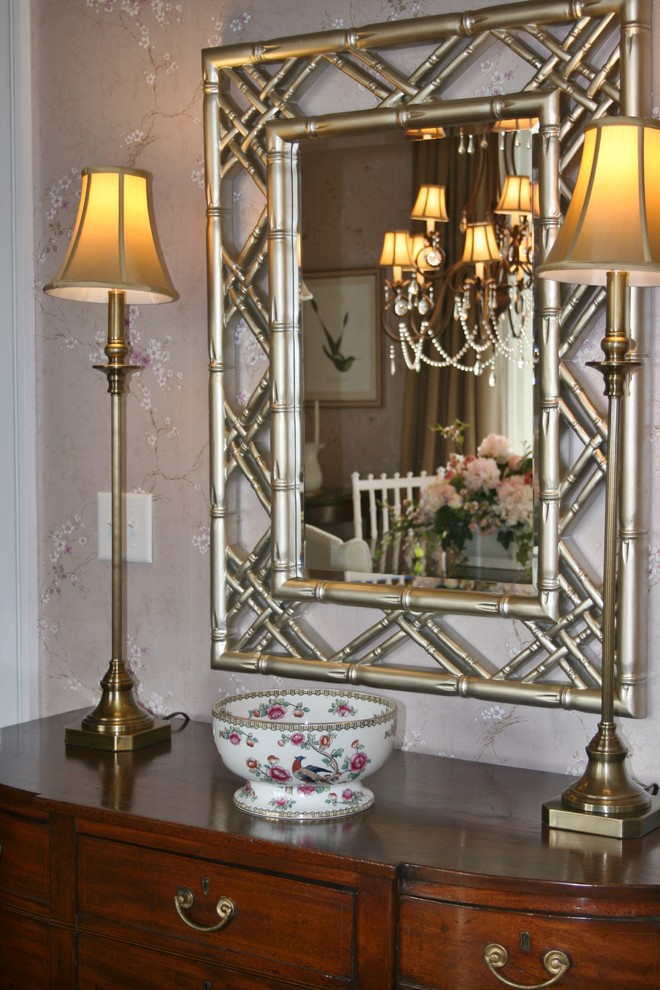 Example of a mid-sized transitional dark wood floor enclosed dining room design with beige walls