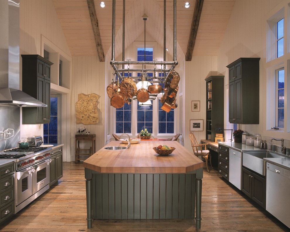 Mid-sized transitional u-shaped medium tone wood floor eat-in kitchen photo in Denver with an undermount sink, raised-panel cabinets, green cabinets, granite countertops, stainless steel appliances and an island