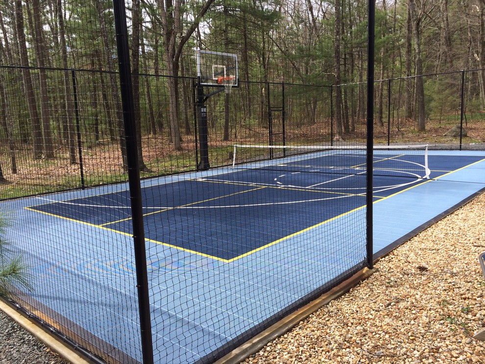 Inspiration for a large traditional backyard full sun outdoor sport court in Boston with with outdoor playset.