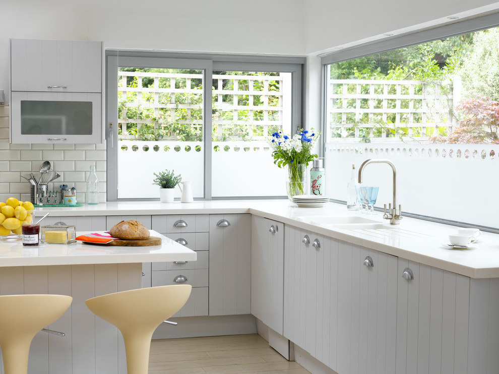 Design ideas for a transitional kitchen in Buckinghamshire.