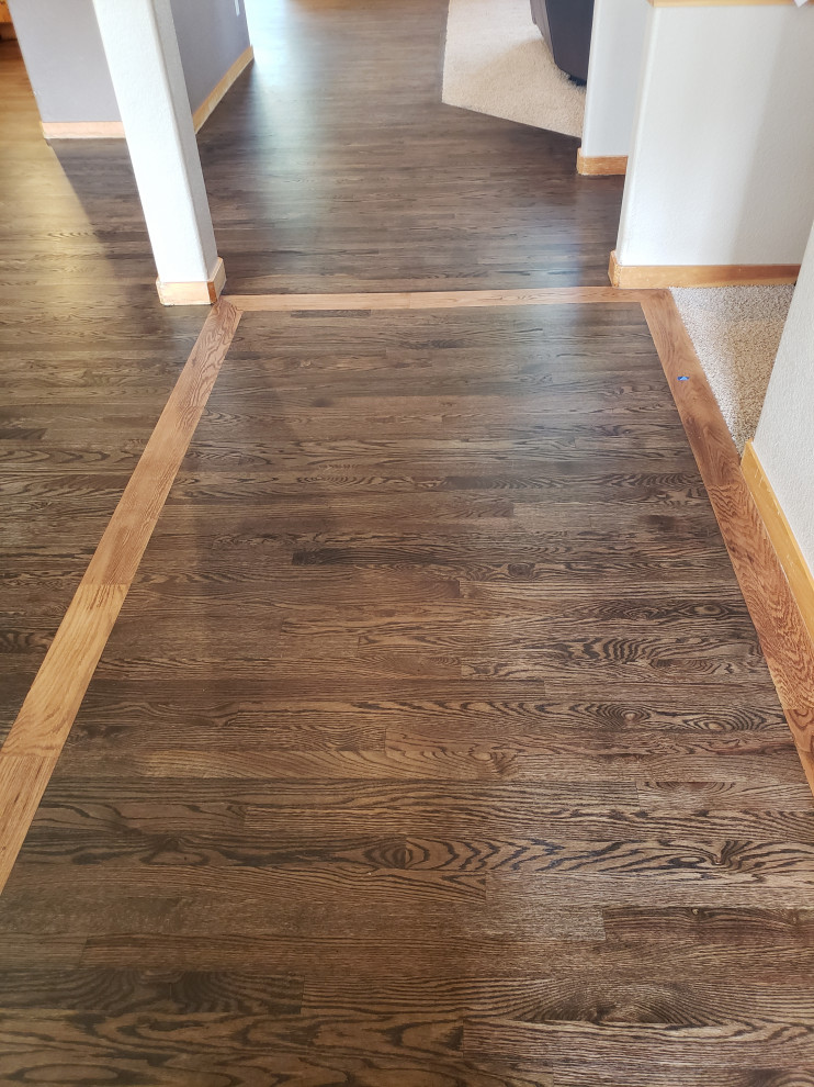 Hardwood Elegance with Custom Inlays & Entry Border