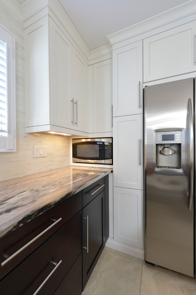 Inspiration for a large transitional u-shaped ceramic tile enclosed kitchen remodel in Toronto with an undermount sink, flat-panel cabinets, dark wood cabinets, granite countertops, beige backsplash, matchstick tile backsplash, stainless steel appliances and an island