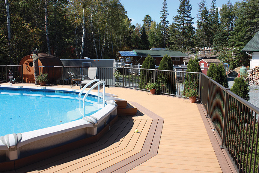 Design ideas for a modern backyard custom-shaped aboveground pool in Toronto.