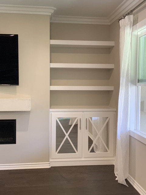 CUSTOM BUILT IN AND FIREPLACE MANTLE