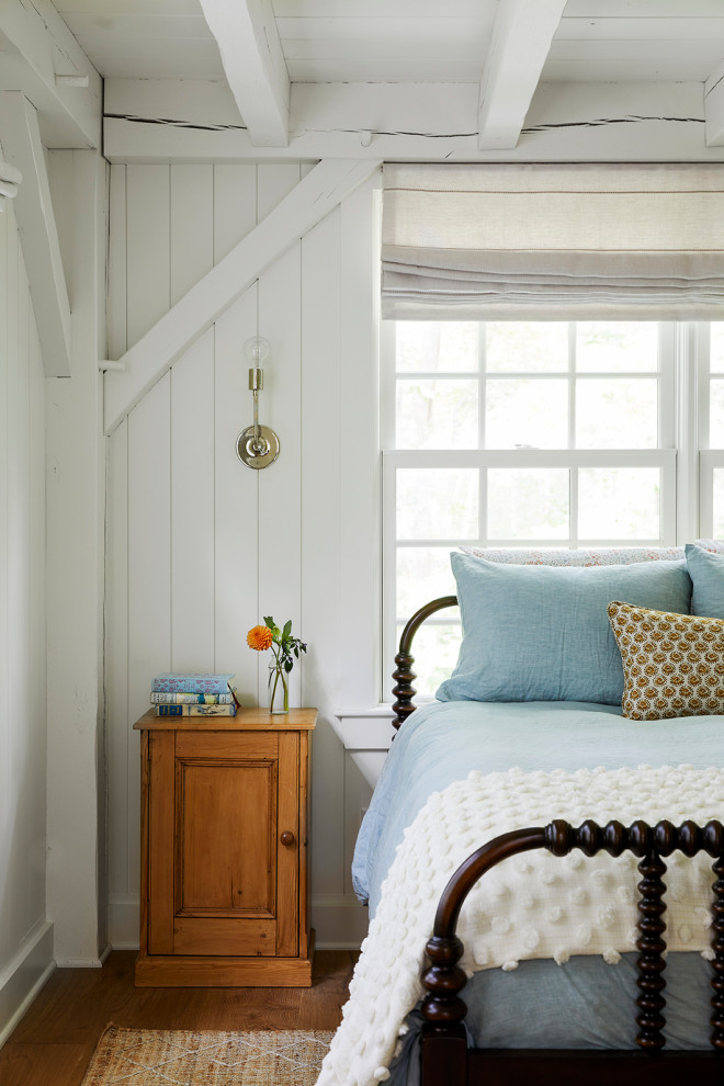 Example of a beach style bedroom design in Portland Maine