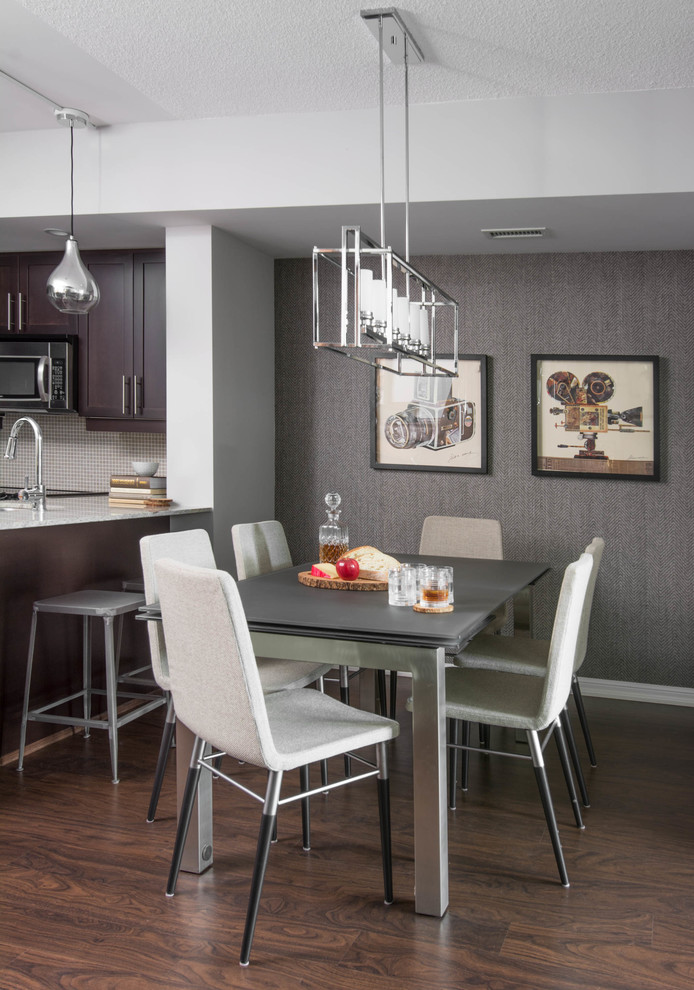 Inspiration for a small contemporary dark wood floor and brown floor kitchen/dining room combo remodel in Toronto with gray walls and no fireplace