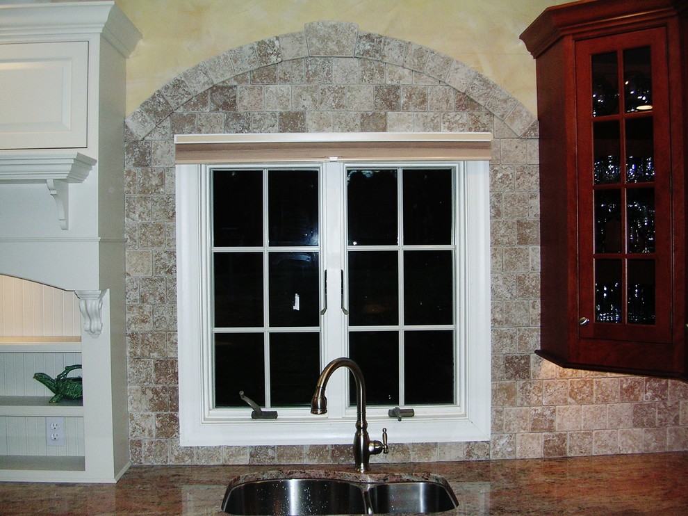 Mid-sized eclectic kitchen photo in Philadelphia with granite countertops, brown backsplash and stone tile backsplash