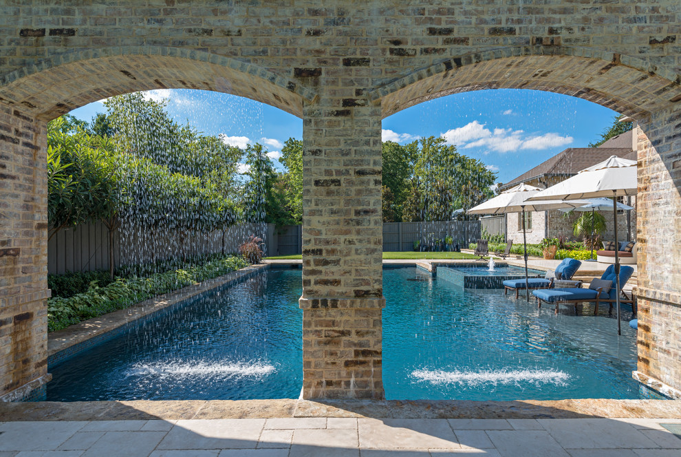 Elegant rectangular pool photo in Dallas
