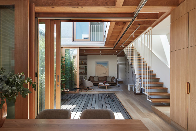 Little OG - view through courtyard to living room, with Kett Furniture  by Cosh  beach-style-living-room