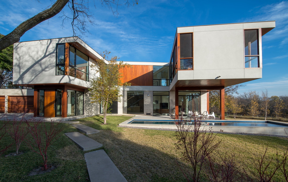 Modern two-storey exterior in Dallas with a flat roof.