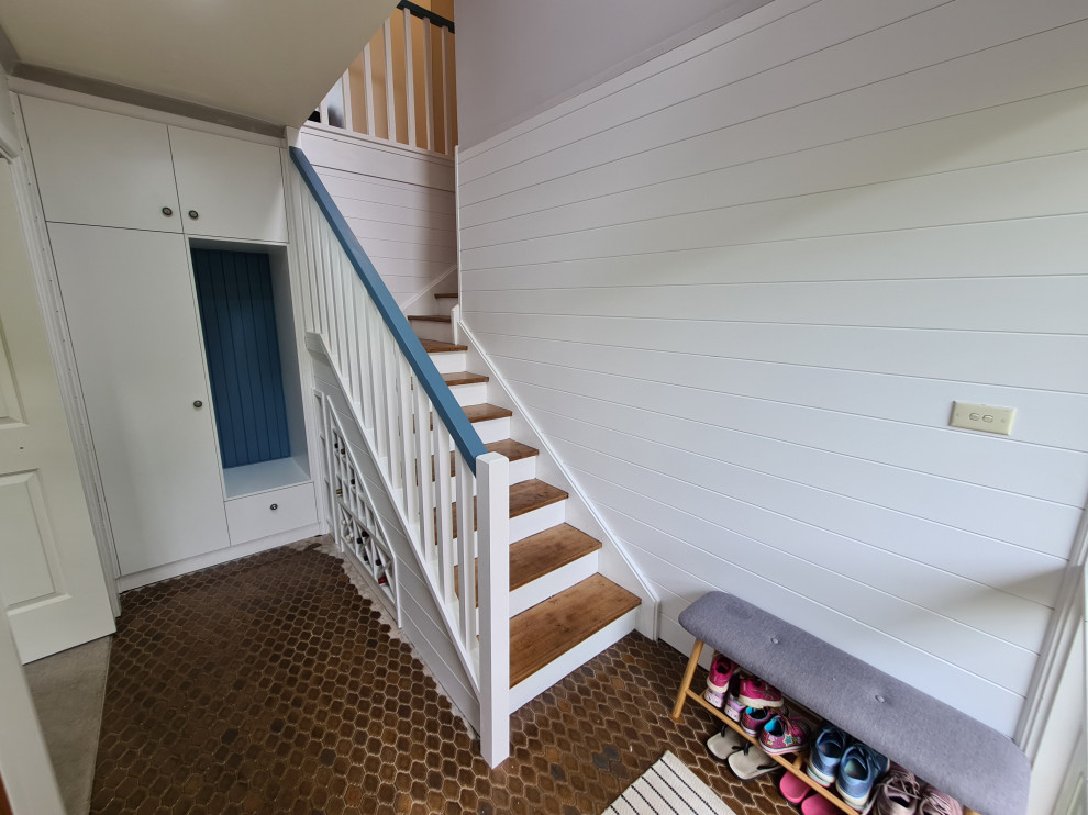 Foyer - mid-sized shiplap wall foyer idea in Canberra - Queanbeyan with white walls
