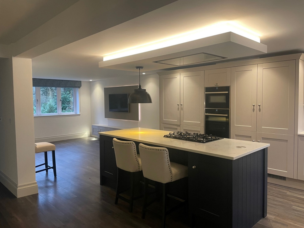 Howdens shaker kitchen with bespoke cornice , knobs and handles