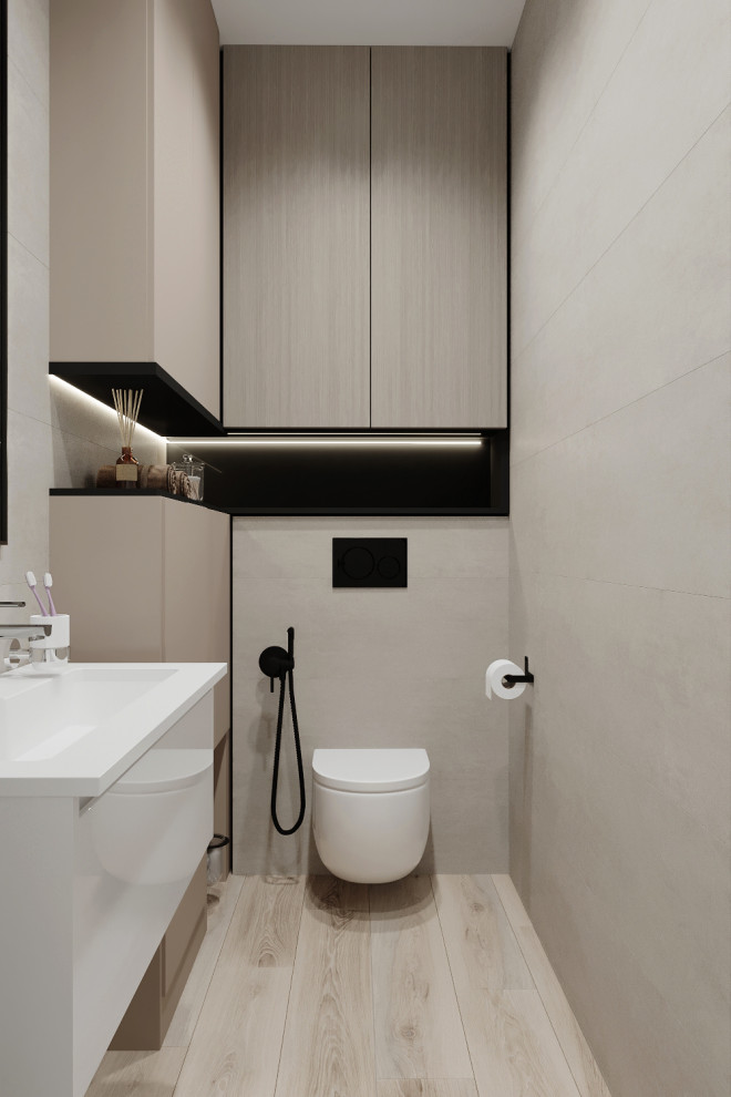 Photo of a small contemporary cloakroom in Saint Petersburg with a floating vanity unit.