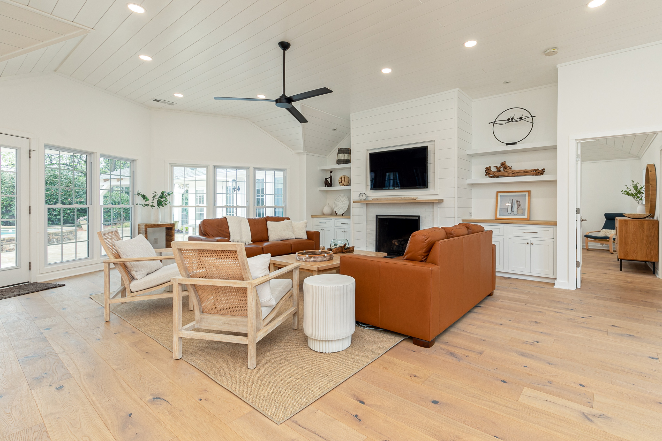 Open Living Room w/ Fireplace & Built Ins