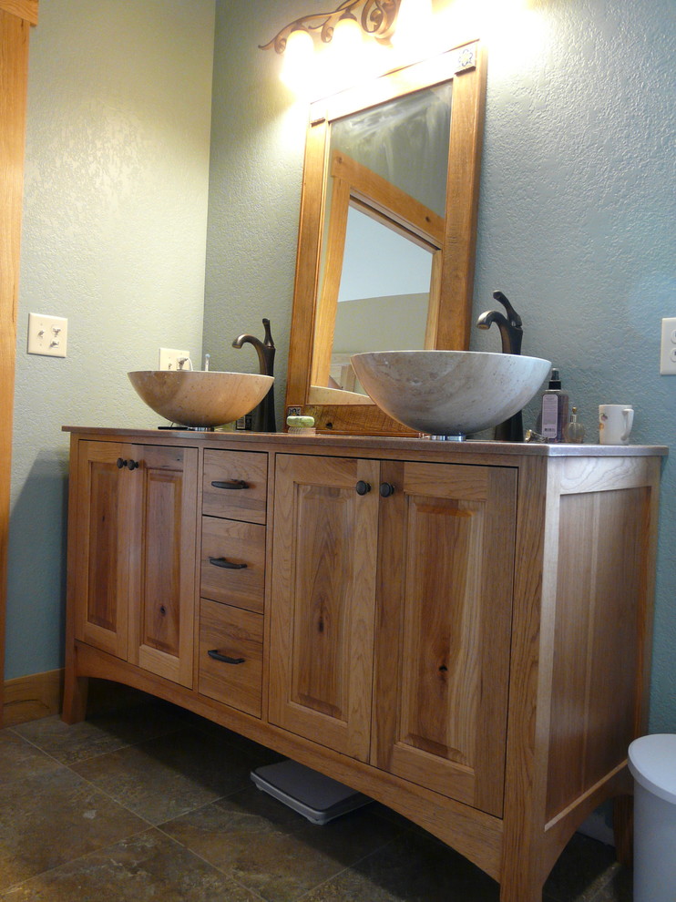 Example of a mountain style bathroom design in Cedar Rapids
