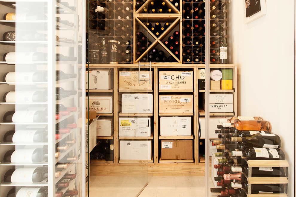 This is an example of a contemporary wine cellar in Hampshire.