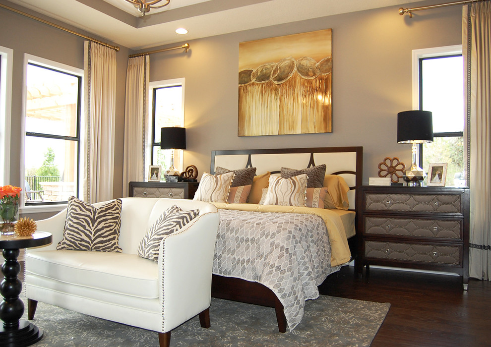 This is an example of a transitional bedroom in Orlando.