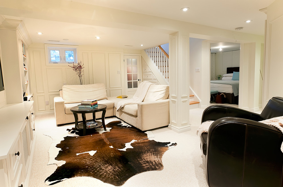 Traditional walk-out basement in Toronto with white walls, carpet and white floor.