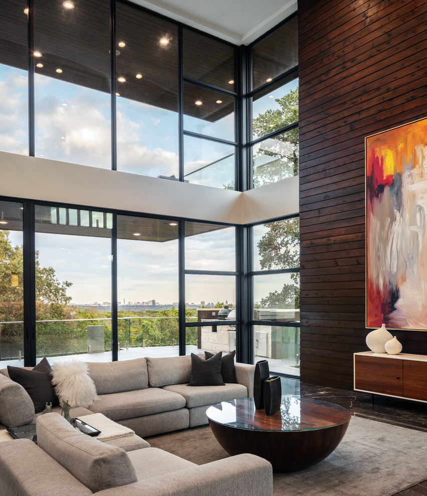 Large contemporary formal open concept living room in Austin with marble floors.
