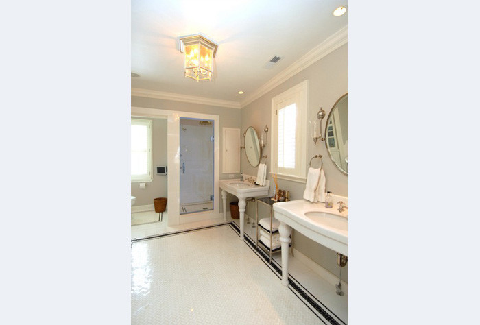 Example of a transitional bathroom design in Miami