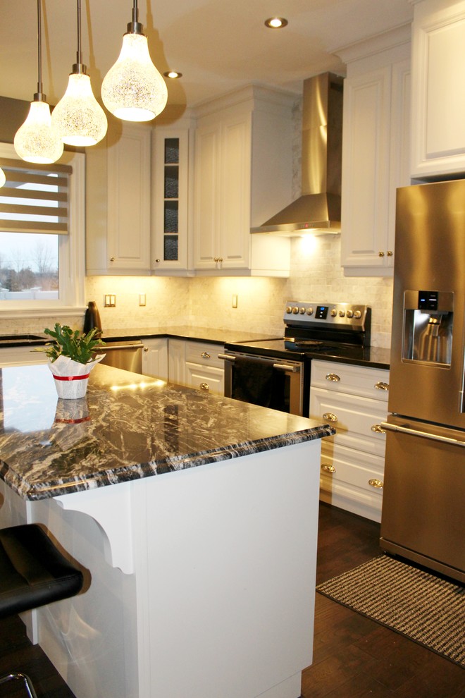 Open concept kitchen - mid-sized transitional l-shaped dark wood floor open concept kitchen idea in Toronto with an undermount sink, raised-panel cabinets, white cabinets, quartzite countertops, gray backsplash, subway tile backsplash, stainless steel appliances and an island