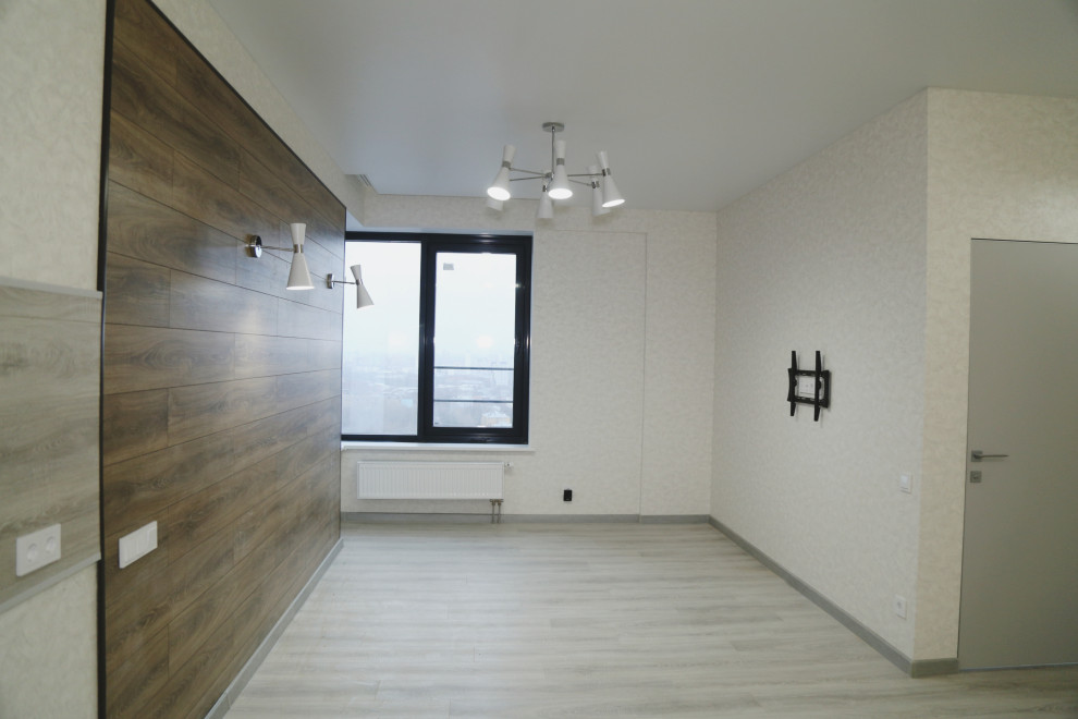 Mid-sized contemporary l-shaped eat-in kitchen in Moscow with light hardwood floors, no island and grey floor.