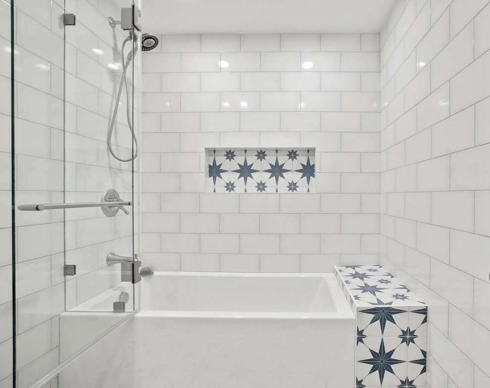 This is an example of a large transitional kids bathroom in Los Angeles with shaker cabinets, blue cabinets, a freestanding tub, a shower/bathtub combo, white tile, porcelain tile, white walls, cement tiles, multi-coloured floor, a double vanity and a freestanding vanity.