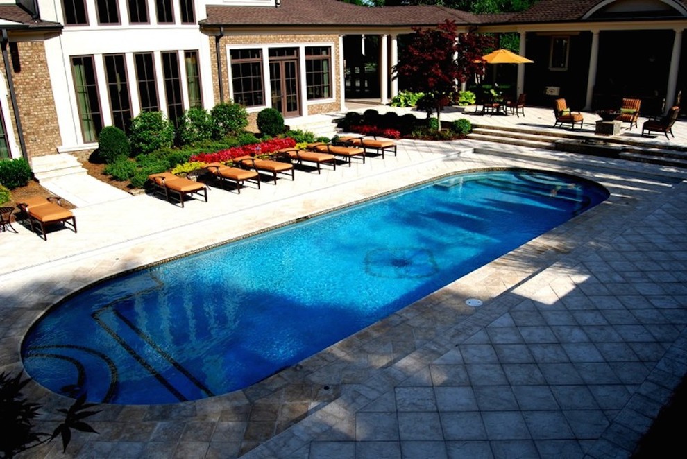 Large transitional backyard tile and round lap pool photo in Nashville