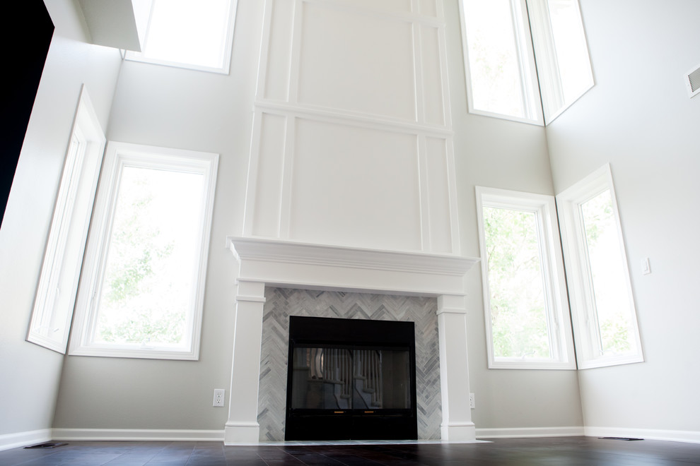 Home design - huge transitional formal and open concept dark wood floor and brown floor home design idea with gray walls, a standard fireplace, a tile fireplace and no tv