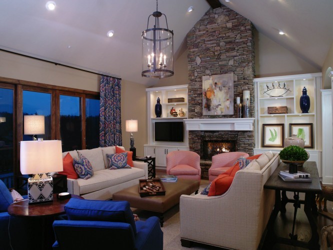 Photo of a mid-sized contemporary formal enclosed living room in Atlanta with a standard fireplace, a stone fireplace surround, multi-coloured walls, medium hardwood floors and no tv.
