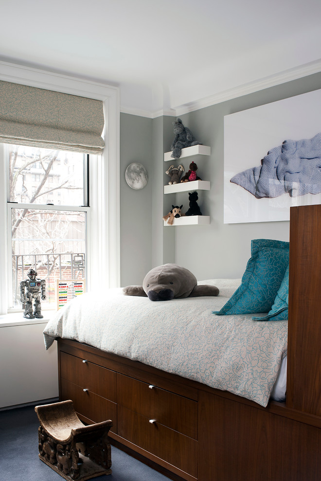 Transitional kids' bedroom in New York with grey walls for boys.
