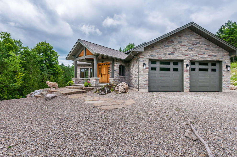 Example of a mountain style garage design in Toronto