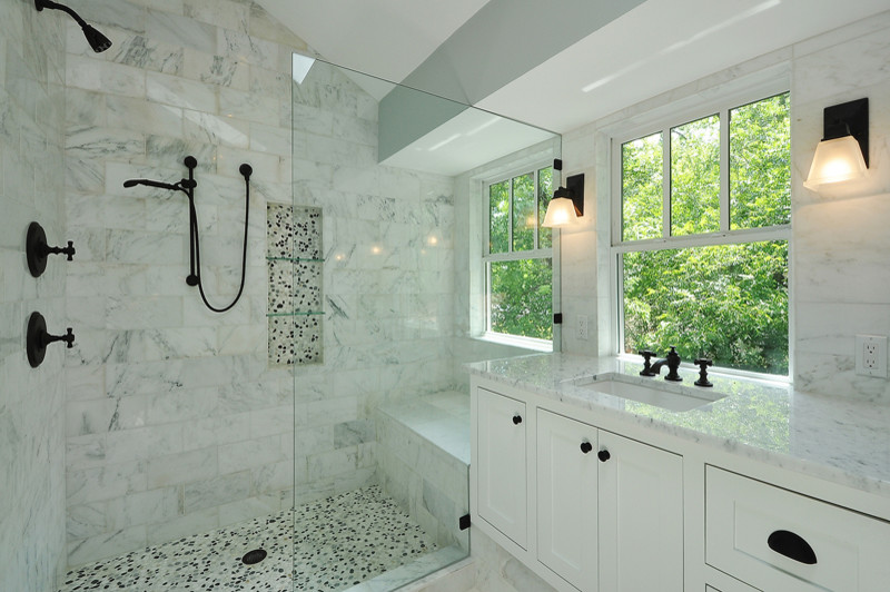 Large transitional master bathroom in Los Angeles with an undermount sink, white cabinets, blue walls, shaker cabinets, a drop-in tub, an alcove shower, gray tile, white tile, marble, marble floors, marble benchtops, white floor and a hinged shower door.