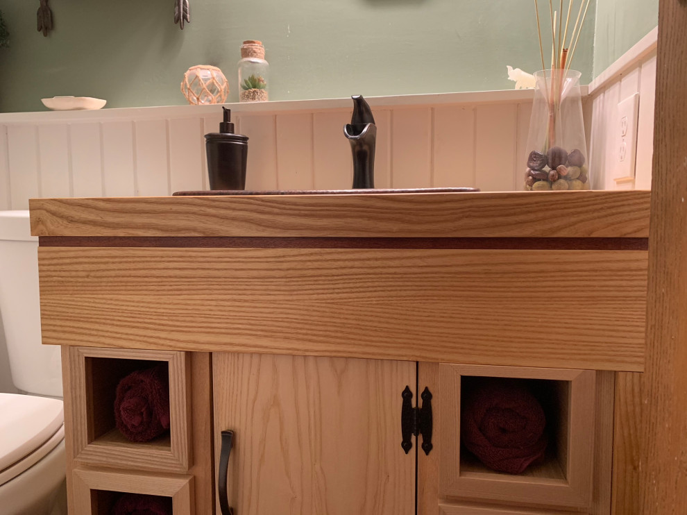 Inspiration for a mid-sized rustic single-sink and wall paneling bathroom remodel in DC Metro with furniture-like cabinets, a drop-in sink, wood countertops and a freestanding vanity